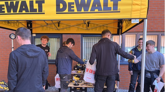 Picture of students at DeWalt's Trade Day stand