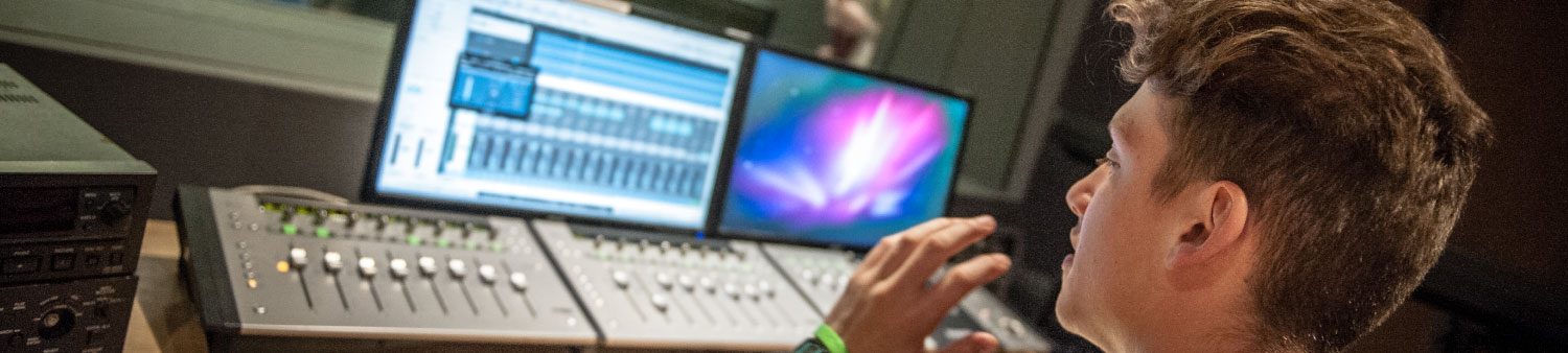 Picture of a student using the music production suite