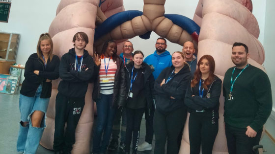 Picture of our students infront of the inflatable lung